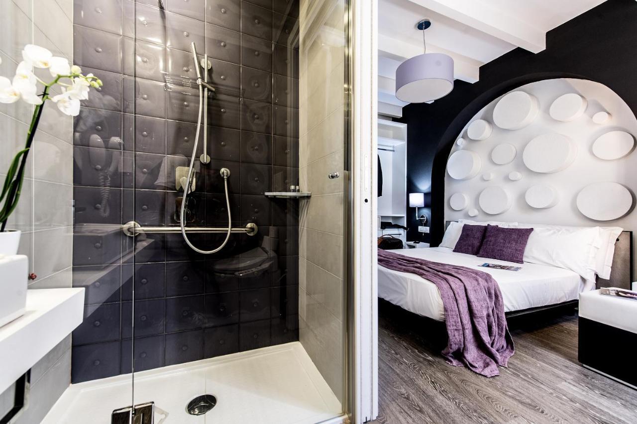 Emphasis Suites & Rooms Cagliari Bagian luar foto