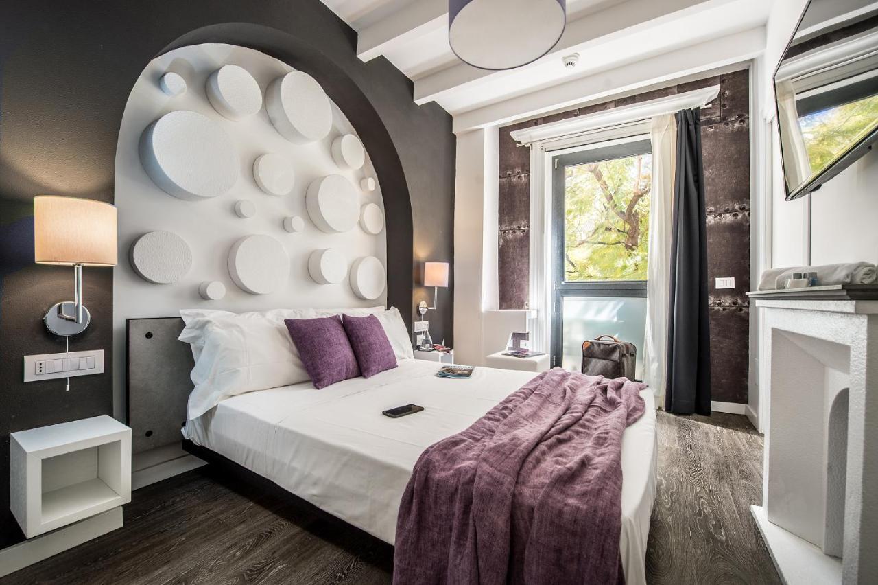 Emphasis Suites & Rooms Cagliari Bagian luar foto