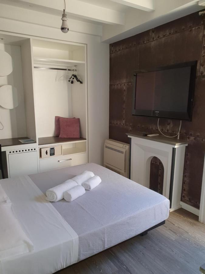 Emphasis Suites & Rooms Cagliari Bagian luar foto