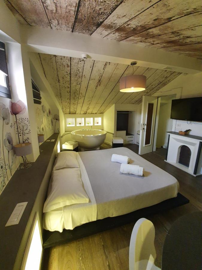 Emphasis Suites & Rooms Cagliari Bagian luar foto