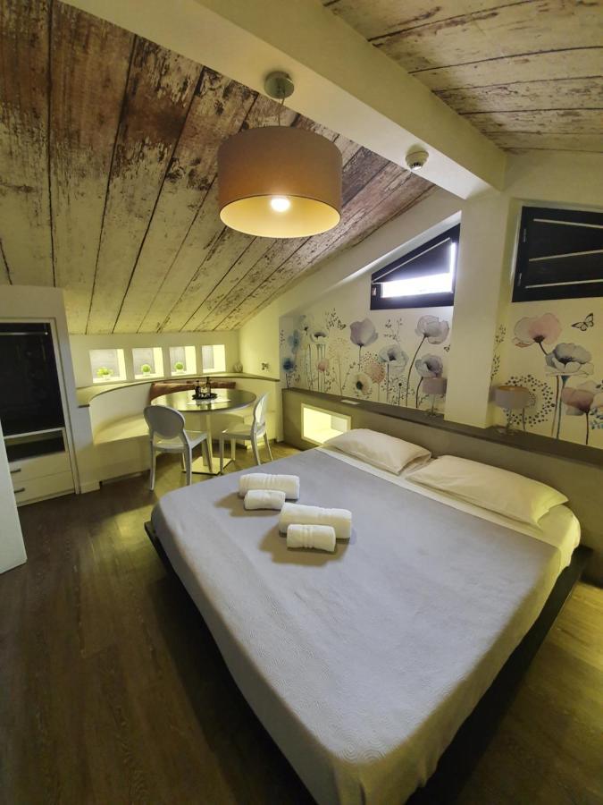 Emphasis Suites & Rooms Cagliari Bagian luar foto