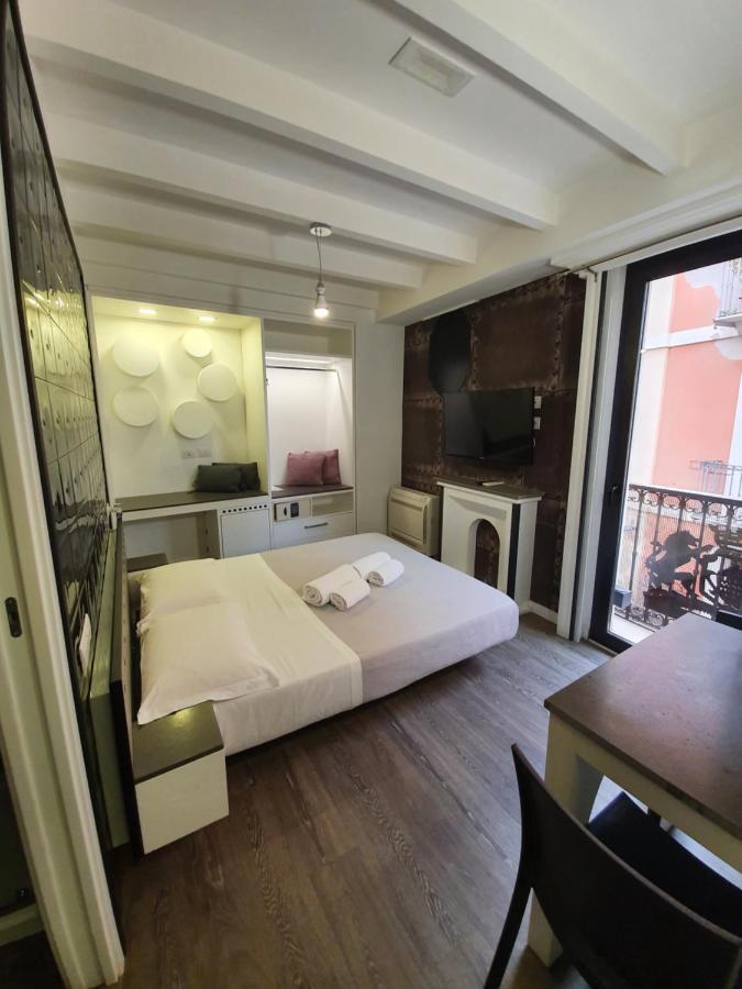 Emphasis Suites & Rooms Cagliari Bagian luar foto