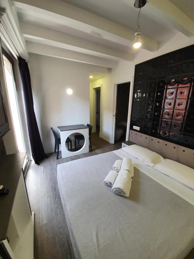 Emphasis Suites & Rooms Cagliari Bagian luar foto