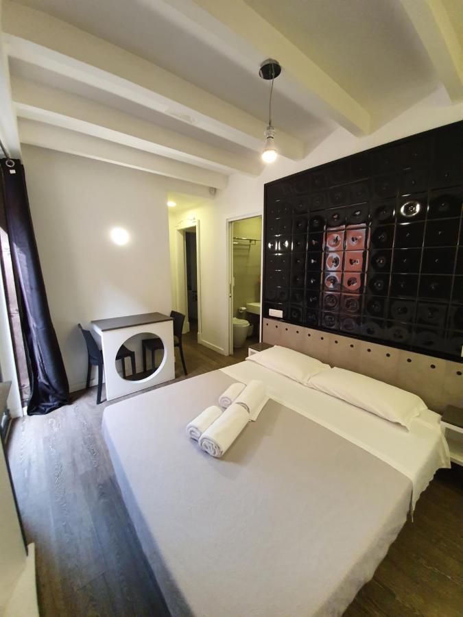 Emphasis Suites & Rooms Cagliari Bagian luar foto